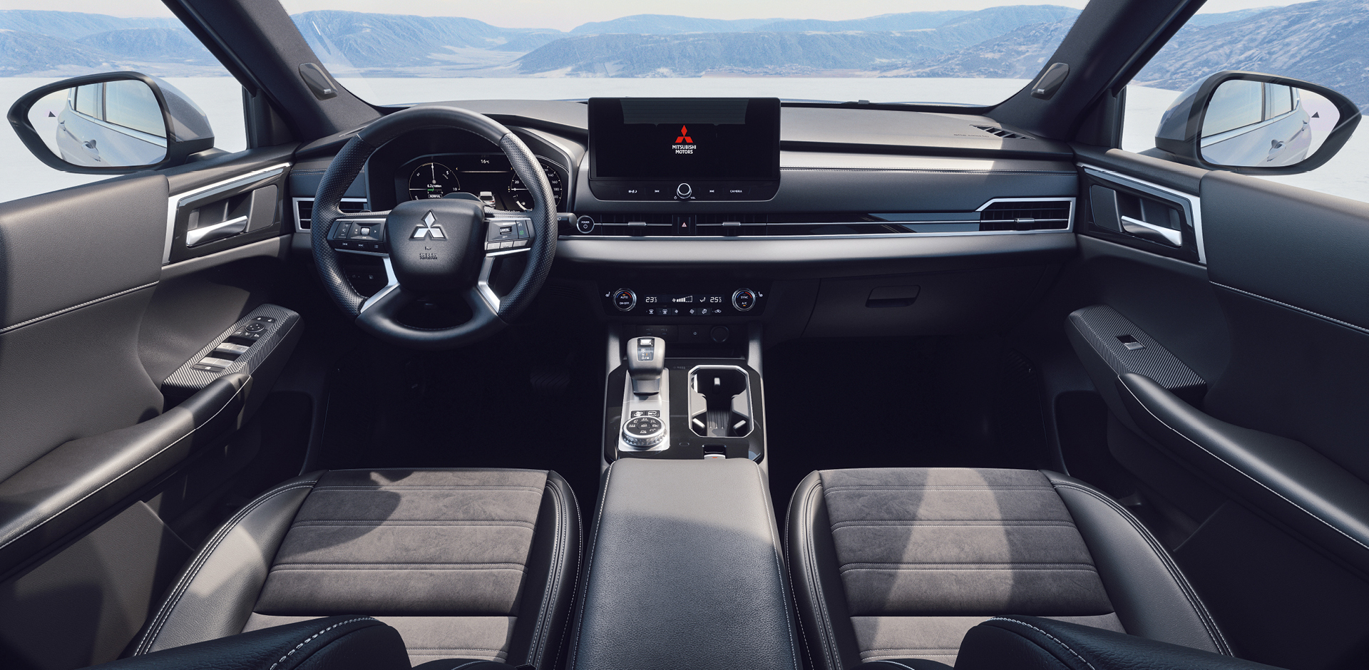Mitsubishi Outlander Select Innenraum-Ansicht mit schwarzen Sitzen, digitalem Cockpit, Touchscreen-Display und modernem Lenkrad
